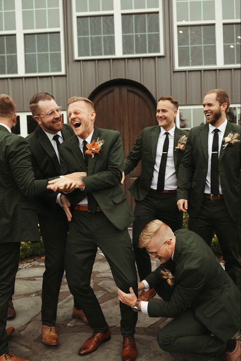 Olive Groomsmen Suits, November Groom Attire, Khaki And Green Groomsmen, Dark Green Suites Wedding, Olive Green Suit Men Wedding Groomsmen, Men Tuxedo Wedding Olive Green, Green And White Wedding Groomsmen, Fall Wedding Mens Suits, Dark Green Wedding Suit Groomsmen