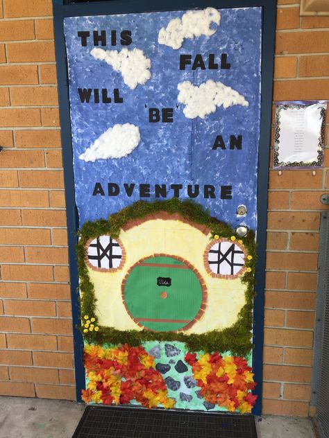 The Hobbit or Lord of the Rings themed classroom door done for my son's Kindergarten class for Fall. This is Bag End, Bilbo/Frodo's home. Look in the clouds for a secret picture. :) Hobbit Classroom Door, Lord Of The Rings Themed Classroom, Literature Themed Classroom Decor, Lord Of The Rings Bulletin Board, Hobbit Classroom Theme, Fantasy Classroom Theme, Lord Of The Rings Classroom, Dnd Classroom, Hobbit Decorations