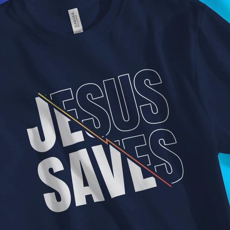 JESUS SAVES (Slash): A cool Christian T-shirt that says it like it is with bold lettering and a unique design. This Premium Unisex Christian T-shirt is designed with a classic fit for men & women alike. This Tee is made of 100% incredibly soft (airlume combed & ring-spun) cotton, preshrunk, fade-resistant & true-to-size. Utilise the Gospel opportunity in your wardrobe today. Christian Shirts Designs Men, Dc Clothing, Christian Merchandise, Christian Graphic Design, Christian Tshirt Design, Christian Shirts Designs, Polo Design, Bold Lettering, Trendy Shirt Designs