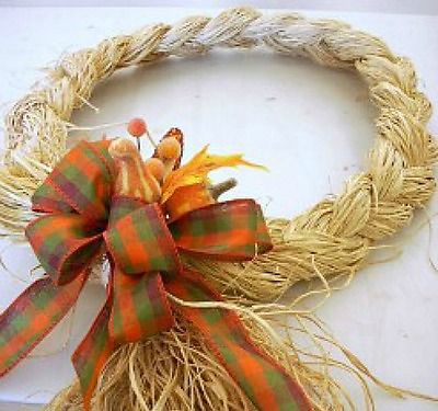 35 Remarkable Raffia Craft Ideas | HubPages Raffia Wreath, Raffia Crafts, Fall Thanksgiving Wreaths, Thanksgiving Wreaths, Sunflower Wreaths, Wreath Bow, Ribbon Crafts, Fall Wreaths, Holiday Wreaths