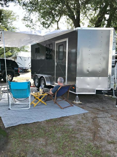 little RV set up for camping with chairs and white awning Converted Cargo Trailer, Enclosed Trailer Camper, Overland Camper, Cargo Trailer Camper Conversion, Toy Hauler Camper, Landscape Trailers, Work Trailer, Camper Diy, Cargo Trailer Conversion