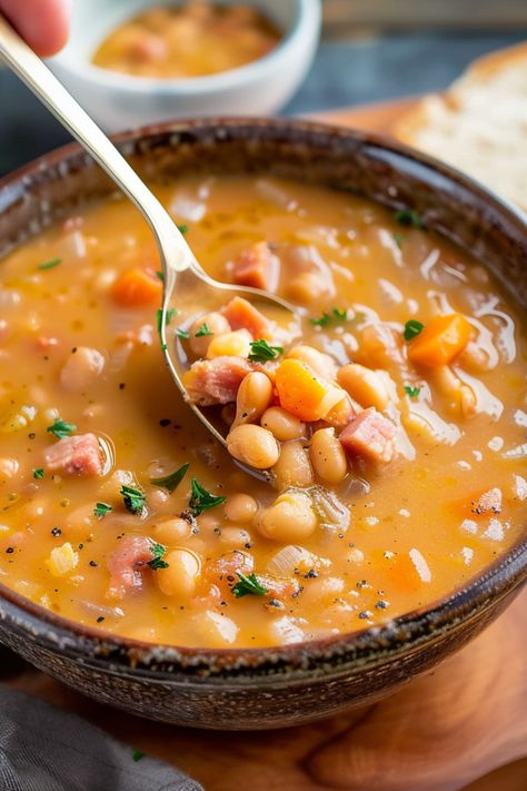 Indulge in a creamy, homemade bean soup with ham recipe, a simple and quick meal perfect for any diet. Featuring ham or hambone and a selection of canned white, Navy, or black beans, this soup is the best choice for a hearty dish. You can prepare bean soup in a Crock Pot, instant pot, slow cooker, pressure cooker, or stove top. Dive into this bean soup with ham recipe and more soup recipes at simplycalledfood.com. Ham Bean Soup Stove Top, Slow Cooker Navy Bean Soup, Ham And Bean Soup Canned Beans, Ham And Bean Soup Recipes Canned Beans, Ham Potato And Bean Soup, Crock Pot Navy Bean Soup, Creamy Navy Bean Soup, Ham And White Bean Soup Recipes, Crockpot Navy Bean And Ham Soup