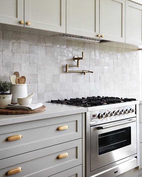 Brodware on Instagram: “Cremorne project by @march_twice_interiors  Featuring our Manhattan pot filler in Brushed Nordic Brass PVD.  Photography: @ryanlphoto” Transitional Kitchen Design, White Porcelain Tile, Scandinavian Kitchen Design, Square Kitchen, Grey Countertops, Fresh Kitchen, White Backsplash, Contemporary Kitchen Design, White Countertops