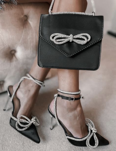 ASOS DESIGN envelope shoulder bag with diamante bow in black satin | Public Desire Wide Fit Midnight heeled shoes with bow detail in black Holiday Party Shoes, Design Envelope, Bow High Heels, Festival Shoes, Refined Fashion, Trending Sandals, Rhinestone Shoes, Public Desire, Latest Shoe Trends