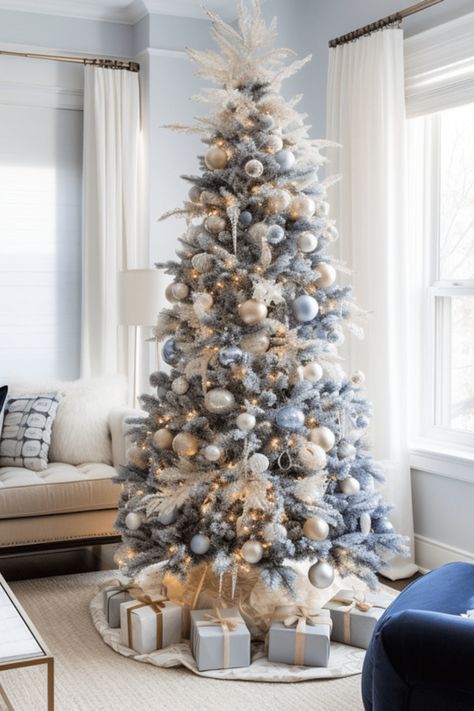 blue and silver Christmas decoration ideas including white christmas trees, blue ribbons, blue ornaments and more Natal, Christmas Blue And White Decorations, Gray Blue Christmas Tree, White Silver Blue Christmas Tree, Blue And Neutral Christmas Tree, Christmas Tree Ideas Silver And Blue, White Silver And Blue Christmas Decor, Blue And Champagne Christmas Decor, Blue And White Christmas Party Theme