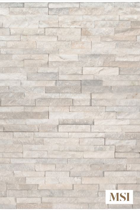 Arctic White Mini Stacked Stone Panels feature an elegant snowy-white palette that’s both timeless and trendy. A petite version of our traditional stacked stone panels, these 4.5x16 split face marble panels are perfectly sized for easy backsplash installation. They’re also a wonderful choice for features walls, accent borders, niches—or nearly any vertical space where a touch of natural beauty is welcomed, even outdoors. Stacked Stone Backsplash White Cabinets, Marble Stone Backsplash Kitchen, White Stackstone Fireplace, Solid Stone Backsplash Kitchen, White Stone Kitchen Backsplash, Genstone Stacked Stone, Stacked Stone Backsplash Kitchen, Limestone Kitchen Backsplash, White Stone Backsplash Kitchen