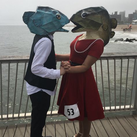 "We used your Fish Head to make masks for the 2017 Mermaid Parade in our hometown of Brooklyn, New York. Our costumes were a HUGE hit and we got a LOT of people asking for pictures as well as some TV and news coverage!!" - Val and Nick Cardboard Animal Costume, Complicated Halloween Costumes, Halloween Art Costumes, Cardboard Costume Ideas, Super Cool Halloween Costumes, Halloween Costumes Handmade, Cardboard Fish Costume, Koi Fish Costume, Silly Costume Ideas