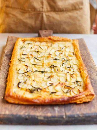 Soft, buttery Jersey Royal potatoes, sweet onions and the fruity tang of taleggio cheese combine in a glorious topping for this quick and easy savoury tart. Pie Pastry Recipe, Taleggio Cheese, Vegetarian Roast, Steak And Ale, Jamie Oliver Recipes, Savory Tart, Tasty Vegetarian Recipes, Jamie Oliver, Tart Recipes