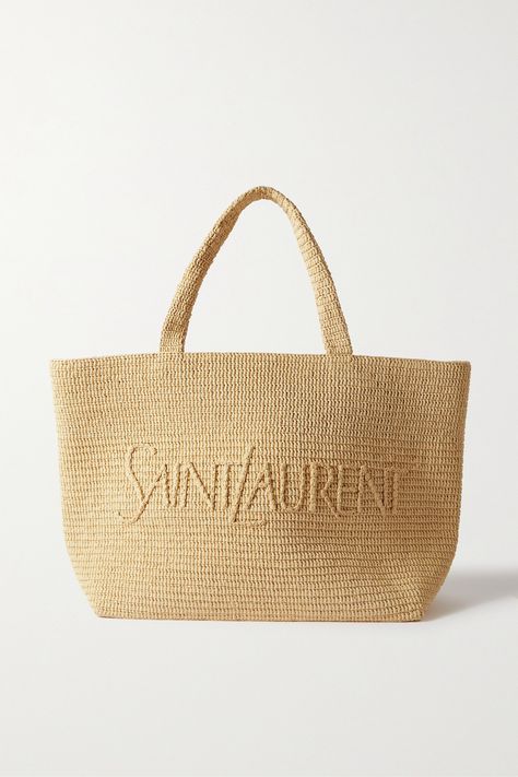 Find SAINT LAURENT Oversized Raffia Tote on Editorialist. Oversized bags are a key trend for Spring '24, and SAINT LAURENT's tote is especially chic. It's made from raffia and is spacious enough for all your essentials, plus a laptop or picnic blanket, and woven with the house's logo across the front. Team it with a blazer and jeans to mirror the house's classic styling. Best Beach Bag, Saint Laurent Tote, Yves Saint Laurent Bags, Oversized Bag, Raffia Bag, Straw Bags, Style Savvy, Straw Tote, Everyday Accessories