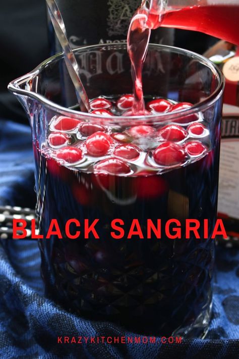 A fun, bold, and fruity sangria dressed up for Halloween. Black Sangria is a real crowd-pleaser. It's easy to make and it's great as a signature party cocktail. Black Sangria Recipe, Alcohol Recipes Halloween, Alcohol Drinks For A Crowd, Halloween Sangria Recipes Easy, Vampire Sangria, Halloween Sangria Recipes, Halloween Party Drinks Alcohol, Halloween Sangria, Black Sangria