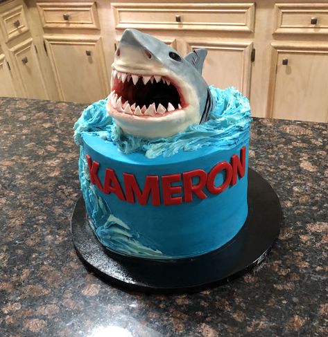 Shark Cake 3d Shark Cake, Megladon Shark Cake, Siren Head Cake Ideas, Megladon Cake, Shark Themed Birthday Cake, Jaws Cake Ideas, Shark Birthday Cake Ideas, Shark Party Cake, Jaws Birthday Cake