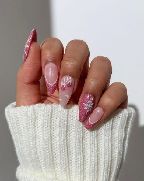 Pink Winter Nails 2024 – 2025: Trending Designs You’ll Love This Season 25 Ideas Pink Holiday Nails Almond, Pink Almond Christmas Nails, Almond Nails Designs Winter Holidays, Christmas Nails Almond Pink, Winter Christmas Nails Almond, Pink Christmas Almond Nails, Pink Snowflake Nails Acrylic, Christmas Nails 2025, Christmas Nail Ideas Almond