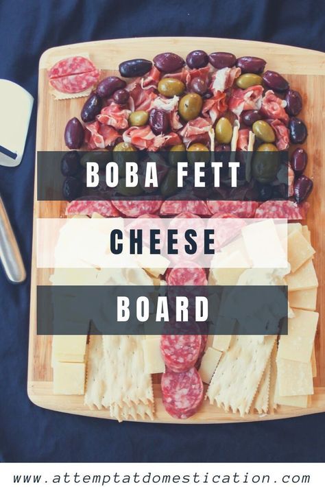 This Boba Fett cheese board is made with a variety of cheeses, prosciutto, salami and olives shaped like the infamous Star Wars Mandalorian bounty hunter. Star Wars Charcuterie Board, Star Wars Charcuterie, Mandalorian Wedding, Mandalorian Party, Star Wars Snacks, Olive Bar, Star Wars Baby Shower, Star Wars Theme Party, Star Wars Bounty Hunter