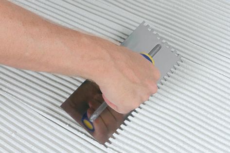 The 8 Tiling Tools All DIYers Should Have — Tips From Bob Vila Bathroom Tile Diy, Tile Spacers, Steel Floor, Tiling Tools, Concrete Tools, Diy Tile, Tile Saw, Tile Projects, Adhesive Tiles