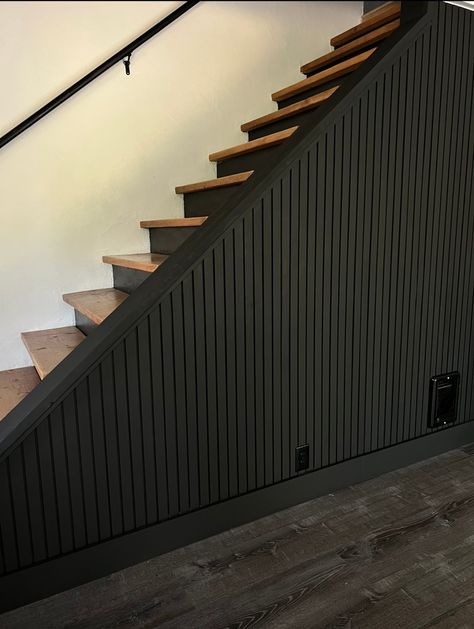 DIY Black Slat Wall (with before and after photos) - DIY WITH DANIELLE Black Slat Wall, Shiplap Hallway, Slat Wall Diy, Stairway Accent Wall, Black Fireplace Wall, Stained Shiplap, Stairway Wall, Pole Wrap, Black Stairs