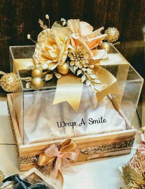 Our Pretty bridal acrylic Trousseau box! Super classy for gifting! Wood hampers with decor for cosmetics & accessories! 💝 In complete awwe of these! #trousseaupacking #acrylicbox #trays#weddingtrousseau #woodentrays #woodenplatters #floraldecor #acrylicboxes #floralboxes #trousseaupackingservices #luxurygifting ##bespokepackaging Acrylic Box Gift Hampers, Acrylic Box Design Ideas Gift, Acrylic Gift Box Ideas, Wedding Basket Gift Ideas, Acrylic Box Packaging, Acrylic Box Gift, Wood Hamper, Wedding Hampers, Diy Projects For Adults