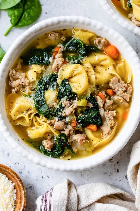 This easy Sausage Tortellini Soup is a cozy one-pot meal that comes together quickly, making it ideal for busy weeknights. It’s a complete, satisfying dinner that the whole family will love. #onepot #soup #tortellini #sausage #dinner #highprotein Sausage Kale Tortellini, Spinach And Tortellini Soup, Spinach And Tortellini, Sausage Tortellini Soup, Pizza Soup, Med Diet, Sausage Tortellini, Healthy Soups, Tortellini Pasta