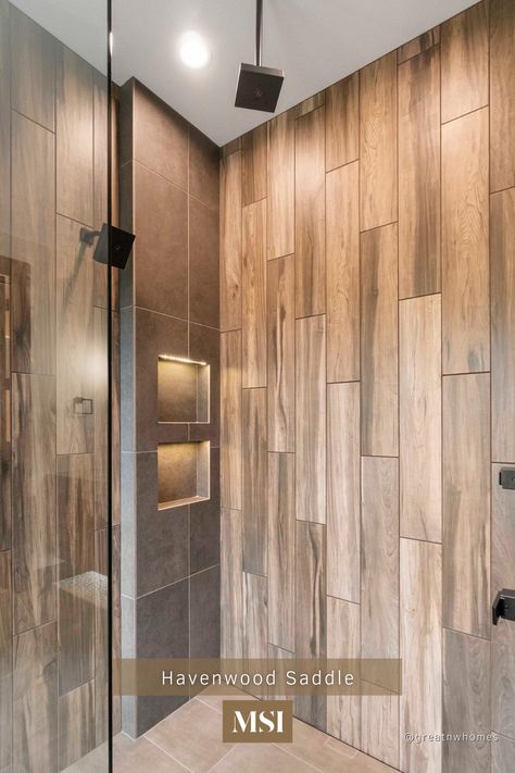 Create a dream shower with wood-look porcelain tile. Havenwood Saddle Wood features warm golden brown grain and chocolate knots that compliments every design stile without the maitenance or fuss of other materials! Walk Around Shower No Door, Organisation, Porcelain Wood Tile Shower Walls, Wooden Tiles Shower Wall, Wood Looking Shower Tile, Wood Grain Shower Tile, Wood Grain Tile Shower Wall, Wood Plank Tile Shower Wall, Vertical Wood Tile Shower Ideas