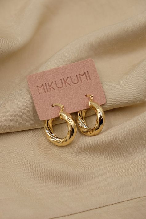 Lightweight Gold Hoop Earrings details: - 18K Gold Filled over copper - Small: 16mm. Thickness: 2mm - Medium: 30mm. Thickness: 5mm - Croissant: 25mm. Thickness: 5mm - 100% hypoallergenic, Lead & Nickel Free Please note we cannot refund or exchange earrings because of hygienic reasons. Product care: - You can shower with it however you should avoid saltwater/ swimming pool/ jacuzzi since it can corrode the gold layer. - Avoid the jewelry coming into contact with perfume or lotions. - Store aw Hoco Jewelry Gold, Gold Hoop Earrings Aesthetic, Trendy Gold Earrings, Chunky Gold Earrings, Thick Gold Hoop Earrings, Hoop Earrings Chunky, Thick Gold Hoops, Creative Jewelry Photography, Chunky Hoop Earrings