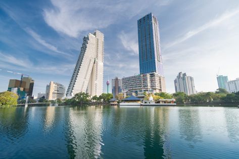 Colombo city skyline, sri lanka | Premium Photo #Freepik #photo #tree #water #city #light Colombo City, Water City, Sri Lanka Beach, Nuwara Eliya, Tea Estate, City Light, Hindu Temple, White Water Rafting, Photo Tree