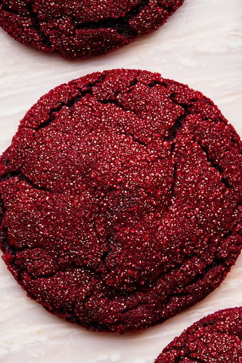 If you love red velvet cake, this easy one-bowl red velvet cookie recipe has your name written all over it. The cookies have just the right balance of crispy edges, soft middles, and big chocolate flavor, with the prettiest shade of red in the land and crunchy sparkle from sanding sugar. In addition to requiring no special equipment, you won’t need to refrigerate this cookie dough or let it rest before baking, making it perfect for when you need a cookie right away. Red Velvet Cookie Recipe, Velvet Cookies, Big Chocolate, Red Velvet Cookies, Baking Cocoa, Valentines Day Desserts, Gel Food Coloring, Easy Cookie Recipes, Red Velvet Cake