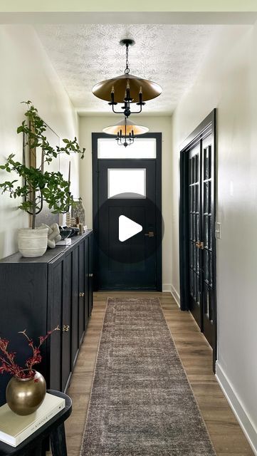 Emily Russo | Home Decor & Motherhood on Instagram: "POV you walk by my entry way. 🥰   You can’t tell me that these pendants lights from @homedepot weren’t meant to be here 🤩 and with a 79$ price tag (😱) it was a no brainer! This is a more narrow entryway and our primary entrance to the house so with five kiddos I needed a landing spot for all the STUFF we have and these Billy bookcases lined up made a perfect entryway storage solution!   Entry way styling | entry way upgrade | organic modern | moody interiors | interior decorating | interior styling | affordable home finds" Organic Modern Entry, Hall Ways Ideas Narrow, Moody Entryway Ideas, Long Foyer Ideas Entryway, Hallway Entry Ideas, Narrow Entrance Hall Ideas, Long Narrow Entryway, Long Entry Hallway Ideas, Moody Entryway