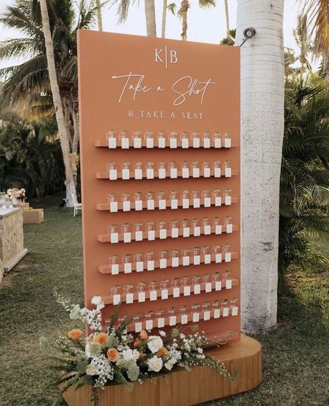 forest wedding drink station display Drink Chart For Wedding, Wedding Tequila Shots Wall, Wedding Eating Table Ideas, Shot Glass Wall Seating Chart, Wedding Guests Seating Chart, Beer Glass Seating Chart, Wedding Seating Chart Drinks, Wedding Seating Chart Shot, Front Door Party Decorations