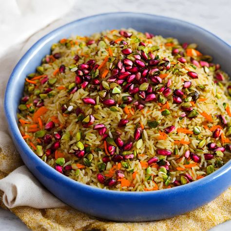 This jeweled rice recipe is a show-stopping dish. The combination of colours and textures paired with the fragrant aroma and complex flavours make this recipe a truly worthy dish for any special occasion. This Middle Eastern inspired rice dish is called jeweled rice due to the that resembles gems. A celebratory dish that is often […] The post Jeweled Rice appeared first on Scrumptiously. Jeweled Persian Rice Pilaf, Rice With Gravy, Persian Jeweled Rice, Jeweled Rice, Persian Rice, Rice Salad Recipes, Eid Food, Birthday Vibes, Rice Dish