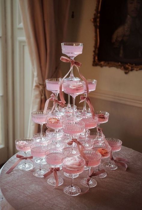 Raising a glass to the finer things in life... like pink champagne towers and lace dreams. 💕✨   Click the link in our bio to discover all of our luxurious collections.💝   #RubyLaceEmpowerment #LuxuryLingerieLove #ConfidenceInLace #BeautyRedefinition #EmpoweredElegance #TransformativeLingerie #EleganceEveryday #LingerieLuxuryLife #ConfidenceIsBeautiful #EmpowerInStyle #RadiantInRubyLace #ChicConfidence #BoldAndBeautifulLingerie #EmpowermentThroughLingerie #LingerieThatInspires #BeautyBeyondSize Indoor Bridal Shower Decorations, Entrees For Party, Meet The Bridal Party Board, Coquette Party Favors, Coquette Centerpieces, Pink Engagement Party, Soft Romantic Wedding, Coquette Theme, Bridal Backdrop