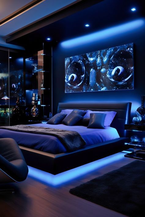 Luxurious modern bedroom in deep black and cobalt blue, featuring a queen-size platform bed, cobalt blue armchair, and spotlighting. Cobalt Blue Bedrooms, Midnight Blue Bedroom, Black Modern Bedroom, Luxurious Modern Bedrooms, Dark Blue Bedrooms, Home Bedroom Design, Dream Bedroom Inspiration, Minimalist Bed, Luxury Bedroom Design