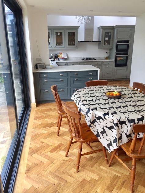 Langton Burbidge kitchen, gravel, seal grey/ peninsular/ marble quartz waterfall worktop/ parquet floor Waterfall Worktop, Budget Renovations, Birch Kitchen, Kitchen Printables, Kitchen Island Storage, Island Storage, Open Plan Kitchen Diner, Parquet Floor, Handleless Kitchen