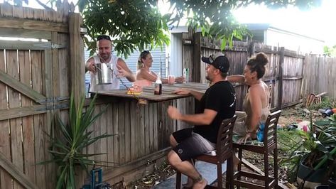 Cairns neighbours enjoy a few beers after creating a fold down fence to socially distance Fence Table Fold Down Neighbors, Fence Bar, Good Neighbor Fence, Front Yards Diy, Backyard Fence Decor, Wood Fence Design, Fence Doors, Outdoor Kitchen Bars, Diy Fence