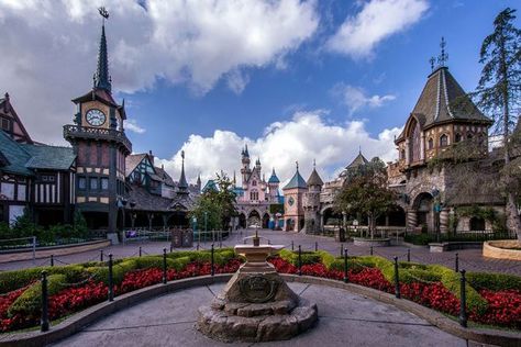 Fantasyland is one of the eight themed lands at Disneyland Park. The land features a central courtyard dominated by King Arthur's Carrousel, in front of which sits a sword in an anvil. Fantasyland is one of the original themed lands at Disneyland. Fantasyland features Sleeping Beauty Castle at its front, which is also the park's icon, and a central courtyard dominated by King Arthur's Carrousel, in front of which sits a sword in an anvil; several times each day a costumed Merlin helps a child Fantasyland Disneyland, Disneyland Fantasyland, Parks Aesthetic, Resort Photography, Disneyland Parks, Disneyland Photography, Real Connection, Central Courtyard, Dumbo The Flying Elephant