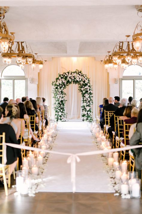 Fall wedding ceremony at Villa Antonia in Austin, Texas | Julie Wilhite Photography | Austin Wedding Photographer  #austinwedding #austinweddingphotographer #villaantonia #fallwedding Chapel Ceremony Decorations, White Aisle Wedding, Inside Wedding Ceremony, Classy Wedding Ceremony, Ceremony Decorations Indoor, Romantic Wedding Theme, Wedding Ceremony Decorations Indoor, Hotel Wedding Ceremony, Wedding Ceremony Aisle