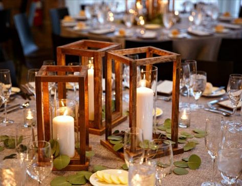 Make your own wedding table decor with these beautiful DIY wood lanterns centerpieces. Perfect for any event and super easy to construct. #diywedding Wood Lantern Wedding, Diy Wood Lanterns, Diy Wooden Lantern, Wood Lantern Centerpiece, Wedding Decorations Diy Centerpiece, Cheap Wedding Centerpieces, Lantern Decor Wedding, Lantern Centerpiece Wedding, Lantern Centerpieces