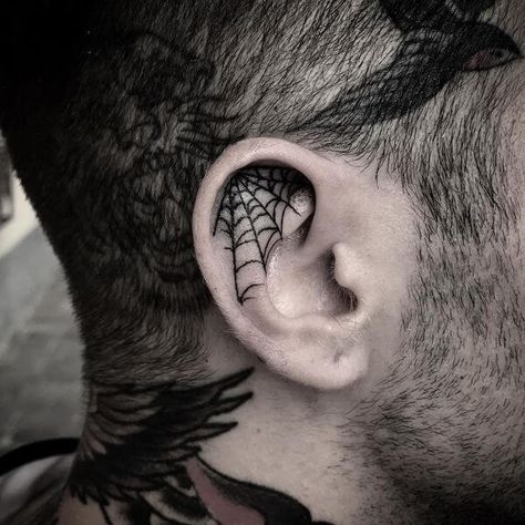 The Most Popular Ear Tattoos Designs for Men Web Ear Tattoo, Side Ear Tattoo For Men, Inner Ear Tattoo Men, Inside Ear Tattoos Men, Inner Ear Tattoos For Men, Mens Ear Tattoo, Spiderweb Ear Tattoo, Back Ear Tattoo Men Guys, Ear Tattoos For Men