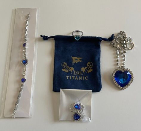 Titanic Jewelry Set Jewelry Set = Necklace, Earrings, Bracelet, Ring, & Pouch Product Details: Style: Titanic Heart of the Ocean Ring Info: Adjustable to fit most people and high quality!! Copper with 925 stamped Silver plated. Bracelet and Necklace: Adjustable and fits most people. Earrings: Refer to pictures for size Other Titanic Products: We have a HUGE selection of Titanic products, please check out our other listings. We Ship In One Business Day with USPS First Class & We Provide Tracking Details If you have any issues, questions, want to return the products, or need further assistance with your order, PLEASE Contact Us before leaving feedback, opening a case, or starting a return case. We strive for 100% customer service and will resolve any issue!! Ocean-inspired Blue Jewelry For Anniversary, Ocean-inspired Light Blue Jewelry For Gift, Titanic Accessories, Titanic Diamond Necklace, Titanic Necklace, Heart Of The Ocean Necklace, Titanic Pendant, Titanic Heart Of The Ocean Necklace, Ocean Ring