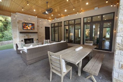 In Texas, there is time year-round for outdoor dining and festivities. This large covered patio space features ample sitting and eating spaces, with entertainment option! From Trent Williams Construction, Tyler, Texas Large Open Front Porch Ideas, Covered Back Patio Farmhouse, Covered Patio With Dining And Seating Area, Built In Barbeque Ideas Outdoor Living, Large Patio Tables Outdoor Living, Shop With Outdoor Living, Outdoor Living Space Covered Patio, Houses With Outdoor Living Spaces, Lanai Dining Ideas