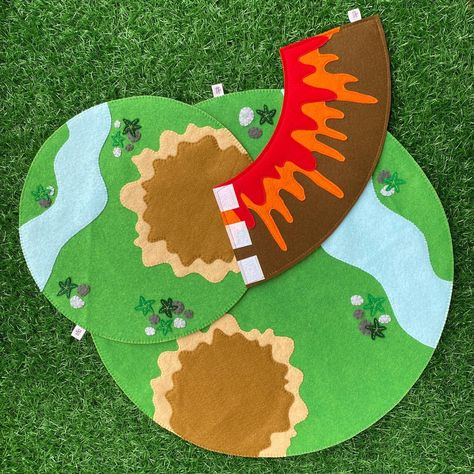 Made my biggest play mat! Original size of 30cm in comparison to the 45cm. It’s a real Dinoland! DM to customise your size… | Instagram Dino Play Mat, Felt Volcano Pattern, Dinosaur Play Mat Diy, Diy Playmat, Acorn Dolls, Felt Playmat, Play Mat Diy, Dinosaur Volcano, Dinosaur Land