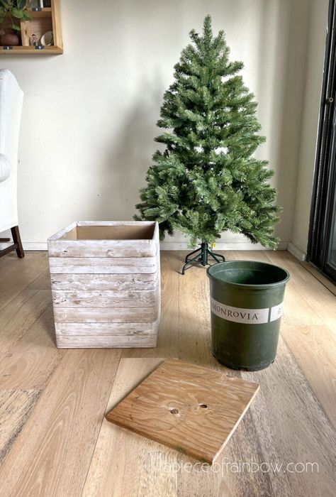 Diy Christmas Tree Base Ideas, Base For Artificial Christmas Tree, Small Christmas Tree In Planter, Christmas Tree Planter Boxes, Christmas Platform Ideas, Diy Christmas Tree Village Stand, How To Make A Christmas Tree Box Stand, Xmas Tree Holder, Elevated Tree Stand