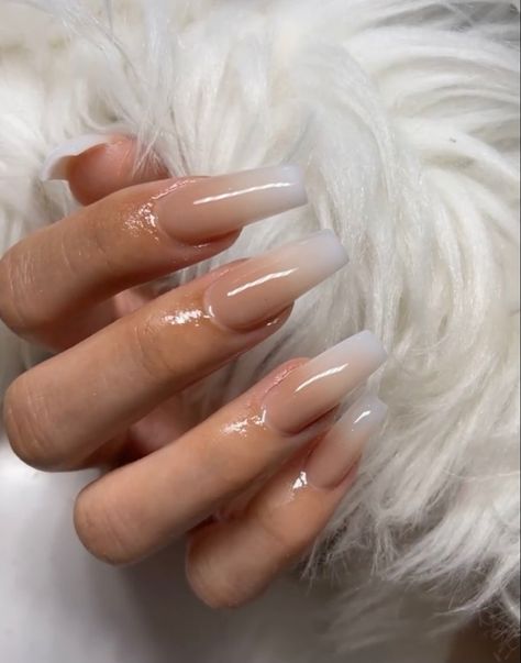 hand with acrylic nails that have nude ombré design against fur backdrop Tan Ombre Nails Acrylic, Ombre Tan Nails, Tan Ombré Nails, 0mbre Nails, Nude Ombre Nails Coffin, Tan Ombre Nails, Tan Nails Acrylic, Tan Acrylic Nails, Classy Ombre Nails