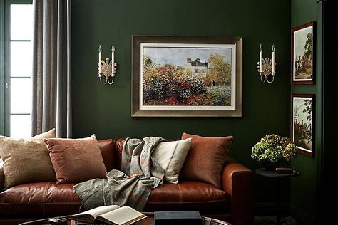 Never would have thought dark green walls would be my thing, but paired with golds and cognac leather...I'm green with envy over this room! Dark Furniture Living Room, Brown Leather Couch Living Room, Green Walls Living Room, Dark Green Living Room, Green Leather Sofa, Leather Couches Living Room, Brown Leather Couch, Green Lounge, Snug Room