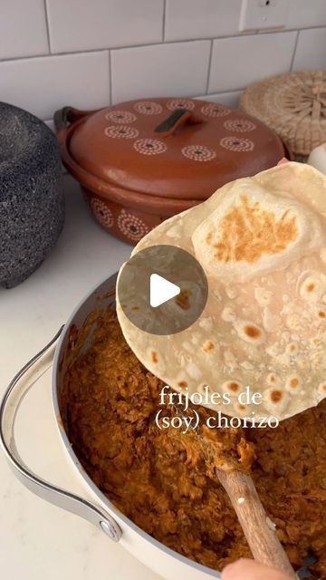 Alexa Soto on Instagram: "Bean burritos & grandma's voicemails 🤧😭🫶

Get my recipe for Chorizo Refried Beans below!

Homemade Flour tortillas video are from my cookbook; PLANTAS : now available for pre-order ;)
& I do have a flour tortilla recipe on the blog : Fuelednaturally.net, But note the book has an new and improved recipe <3 both yummy though.

Recipe: 
* 2-3 tablespons oil
* 1/2 white or yellow onion, diced small 
* 1 guajillo chile, stem and seeds removed
* 3 cloves garlic, minced
* 1 (9-12 ounce) package soy chorizo
* 3-4 cups cooked pinto beans ( reserve 1/2 cup bean juice)
* Optional 1/3 cup cashew crema (recipe on blog) or store-bought vegan sour cream

Add a couple of tbsp oil to a large pan over medium heat. Once hot, add in onion and guajillo chile and saute for 2-3 minut Refried Beans With Chorizo, Chorizo Beans, Cashew Crema, Flour Tortilla Recipe, Guajillo Chile, Soy Chorizo, Crema Recipe, Family Meal Prep, Homemade Flour