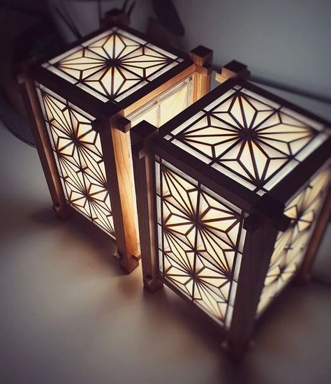 Kristaps on Instagram: "Evening glow... Cherry andon frames with yellow cedars and walnut kumiko panels, fitted with 3 tone dimmable led lights DM if interested 📮 #woodworking #handtoolwoodworking #kumikowoodworking #finewoodworking #maker #crafting #kumikoart #handmade #japanesewoodworking #unique #kumikozaiku #craft #art #kumiko #england #makersgonnamake #design #bespoke #giftideas #oneofakind #hobby #interiorlighting #light #christmasgifts #japaneseandon #interiordesign #homedecor #uk Kumiko Lamp, Japanese Woodworking, Carving Art, Woodworking Hand Tools, Diy Holz, Dimmable Led Lights, Handmade Lighting, Wood Carving Art, Tabletop Decor