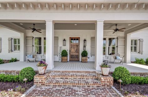 Farmhouse front porch design #frontporch #farmhousestyle #farmhousedesign Modern Farmhouse Columns, Bricked Front Porch, White House With Wood Pillars, Front Porch Floors Ideas, Front Porch Column Ideas Farmhouse, Two Step Front Porch, Farmhouse Exterior Entryway Ideas, Tan Farmhouse Exterior, Brick Steps Front Porch Entrance