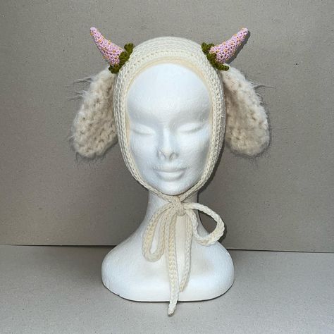 strawberry milkshake goat just came to life in crochet bonnet form. available now @ kazclops dot com Crochet Goat Ears, Cute Crochet Yarn Bonnet, Goat Hat Crochet Pattern, Crochet Hat For Rabbit, Rabbit Hat Crochet, Crochet Bonnet Pattern, Goat Hat, Bonnet Crochet Pattern, Goth Cottagecore