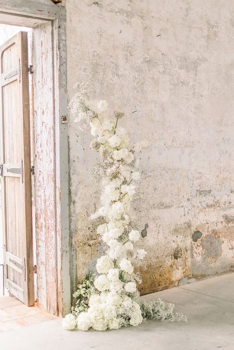 Foam Free Monochromatic All White Wedding Ceremony Floral Arch with hydrangeas, baby's breath, reflexed white Akito roses, ranunculus and allium All White Wedding Ceremony, Wedding Ceremony Floral Arch, Ceremony Floral Arch, White Hydrangea Wedding, Monochromatic Wedding, White Wedding Arch, White Wedding Ceremony, Floral Arch Wedding, White Roses Wedding