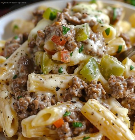 Experience the delightful fusion of juicy steak, creamy cheese, and al dente pasta with our Philly Cheesesteak Pasta. A perfect blend that promises to bring coziness to any meal. Philly Cheese Steak Pasta Ground Beef, Philly Cheesesteak Pasta, Cheesesteak Pasta, Steak Casserole, Rigatoni Recipes, Steak Pasta, Pasta Penne, Prep Meals, Cooked Pasta