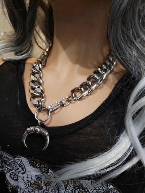 This handmade necklace is Chunky oversized aluminum chain, which means it is lightweight, hypoallergenic, Waterproof and will NEVER tarnish! The oversize horn pendant is stainless steel. This is a stunning piece of alternative punk fashion that will elevate any outfit with its bold and edgy look. It measures approximately 18 inches.    Makes a great gift for the special woman in your life who loves to express herself through bold and unique fashion choices. Punk Mode, Pagan Necklace, Horn Pendant, Edgy Look, Multi Strand Necklace, Handmade Necklace, Strand Necklace, Necklace Handmade, Necklace Gift