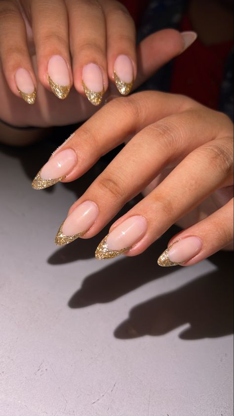 Golden Glitter French Tip Nails, Gold Glitter Tips Acrylic Nails, Nail Ideas Gold Glitter, December Nails New Years, Gold Tip Nails Almond, Gold Sparkle French Tip Nails Almond, Gold Glitter Tip Nails French, Gold Glitter Tips Nails, Golden Tips Nails